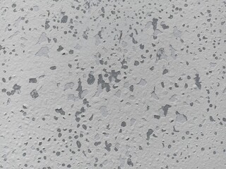 abstract gray and white speckled textured background or seamless terrazzo pattern
