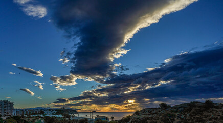 sunrise with heavy clouds