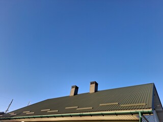 Fototapeta premium metal profile. roofing. replacement of coating for the house. roof repair