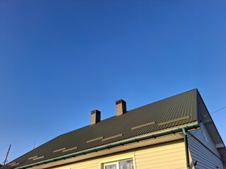 metal profile. roofing. replacement of coating for the house. roof repair