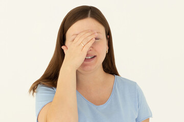 God why me. Portrait annoyed fed up pissed young woman make facepalm hide face close eyes bend head down bothered, tired explaining simple tasks, standing white background