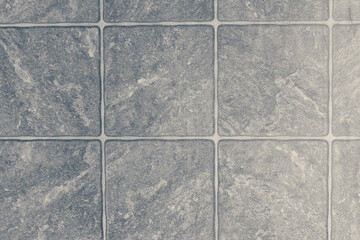 Rough tile surface, square grid pattern