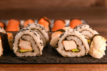 japanese sushi food. Maki ands rolls with tuna, salmon, shrimp, crab and avocado, High quality photo