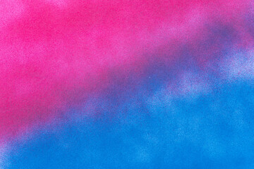 赤色と青色のスプレー塗料で塗った背景	