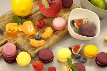 Vibrant scene of table filled with macaroons and fruits