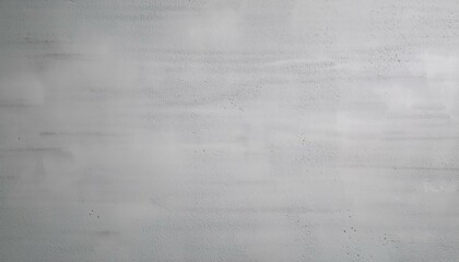 Fototapeta premium 無機質な淡いグレーのコンクリート風テクスチャ。ムラが柔らかく、シームレスで落ち着いた印象を与える。 