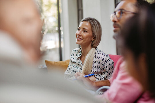 People having a neighborhood meeting at community building