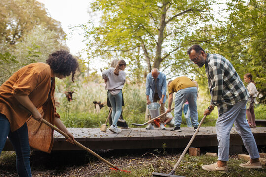 Volunteers helping at community cleanup at the local park