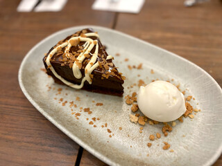 Chocolate Tart with Ice Cream served at Restaurant.