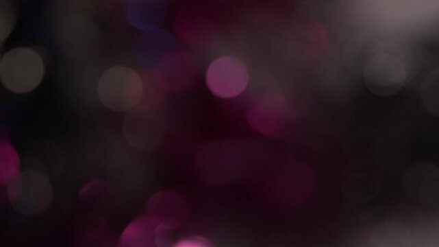 plan fixe effet de bulles de bokeh artistique qui apparaissent de temps &agrave; autres scintillement, fondu au noir, id&eacute;e de transition artistique