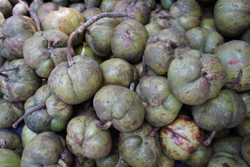 The elephant apples are stored in the village market
