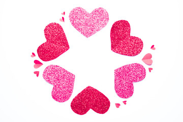 Frame of pink hearts on an isolated white background