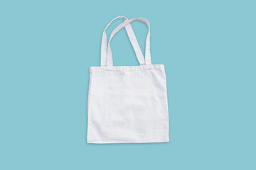 White cotton, canvas, tote, mesh bag on red orange background. Zero waste, no plastic, eco...