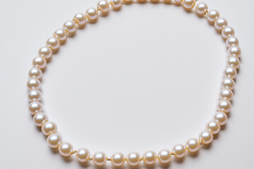 Fototapeta premium Necklace with pearls in on. beautiful luxury fashion concept. w in white with a necklace and pearls on a white. a w in white with a necklace and white for the lifestyle holidays.