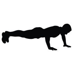 A man doing a push up. He is wearing shorts and a shirt