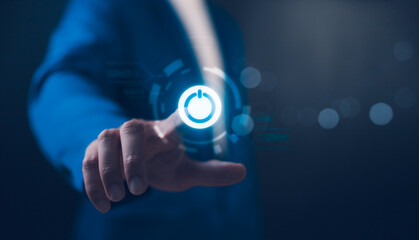 Fototapeta premium Businessman pressing power button concept. Digital technology touch screen. Hardware equipment concept. Start or shut down concept.