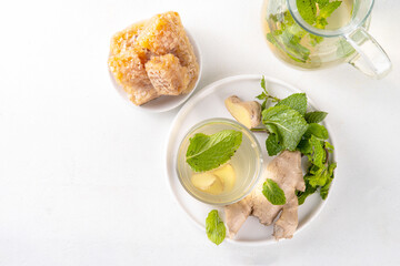 Sweet Ginger Mint Cooler with honey
