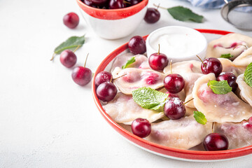Traditional West Europe cherry pierogi dumplings