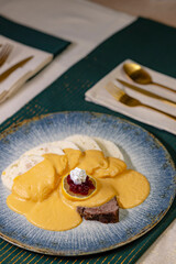 Traditional Christmas dinner in Czech Republic - sirloin in cream sauce