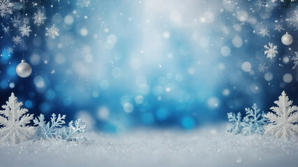 Blurred christmas background. Snow and snowflakes on blue with light bokeh.