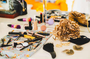 Beauty routine setup with cosmetics and accessories on vanity table