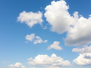 Obraz premium A serene blue sky with fluffy white clouds on a sunny spring morning, vibrant greenery, gentle breeze