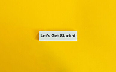 Let’s Get Started. Motivational Phrase. Text on Letter Tile on Yellow Background. Minimal Aesthetic.