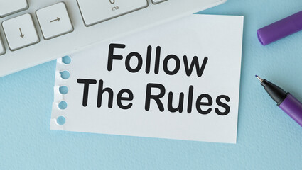 Business concept. Notebook with text know the rules sheet of white paper for notes, calculator, glasses, pencil, pen, in the white background