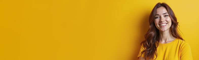 Naklejka premium Woman with cheerful smile against bright yellow background with copy space