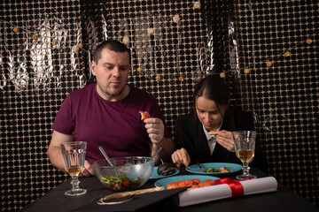 family celebration, father and daughter celebrate graduation, cheers and drinks during the event