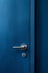 Obraz premium A blue door with a silver handle, close-up, in a simple, minimalistic style