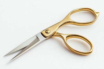 Fototapeta premium Gold scissors on white background.