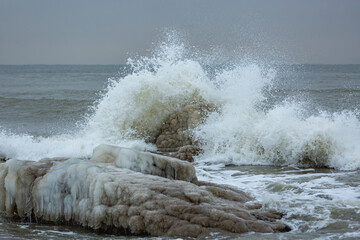 Icy constructions in the sea in winter