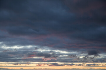 Beautiful skyscape with clouds at sunrise