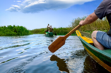 CHAPADA DIAMANTINA, BAHIA STATE, BRAZIL, tourists paddling on tropical river in national park made of canyons, forest, waterfalls and lagoons, near Lencois de Bahia