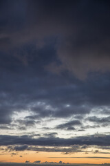 Beautiful skyscape with clouds at sunrise