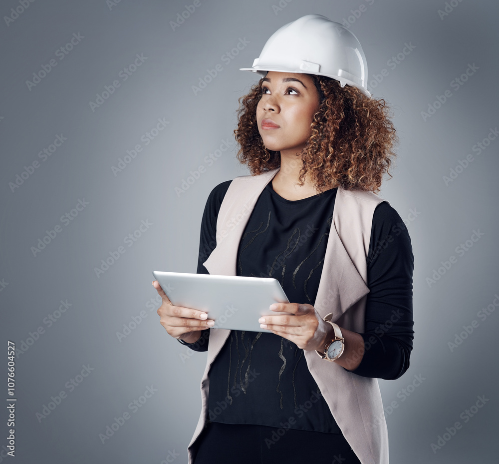 Poster architect, helmet and tablet in studio for thinking, construction and renovation progress update. en