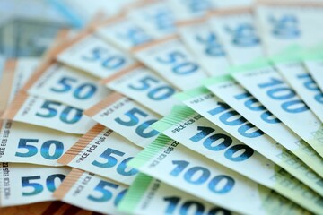 Many real european euro banknotes in big pile