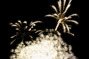 Fireworks lighting up the night sky. Pyrotechnics, abstract	