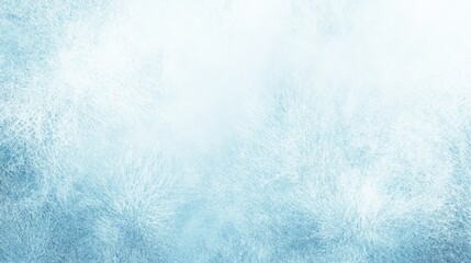 Fototapeta premium A light blue background with a delicate pattern of frost or ice crystals. The image evokes a cold, wintery scene, with the soft texture of the ice creating a dreamy and ethereal atmosphere