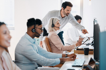 Woman, man and teaching by computer in contact center with review, feedback and support at telemarketing agency. Mature manager, people and coach with agent, advice and point with pc at help desk