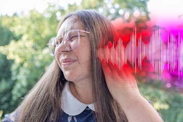 mature woman ear closeup listening, sound wave, acoustics Auditory System, Hearing Test, Cochlear...