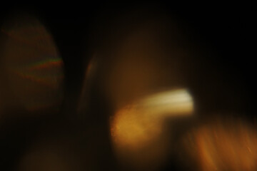 Prismatic Luxury Gold Overlays – High-resolution abstract light and golden bokeh textures....