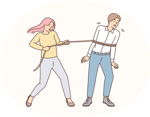 Naklejka premium Smiling woman put rope on man drag him closer. Desperate female throw lasso on male lover, ask for love and affection.