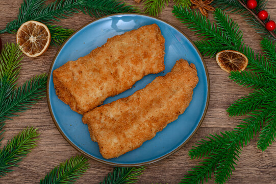 Traditional Christmas Eve dish, breaded fried fish, cod fillets,