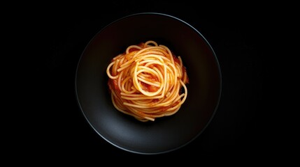 Delicious Spaghetti in Black Bowl on Dark Background