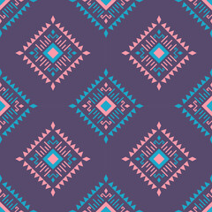 Abstract ethnic seamless pattern in tribal.Modern textile in native American,Mexican,African, mediterranean style.Aztec geometric fabric folk art background.Colorful boho design for print decorate