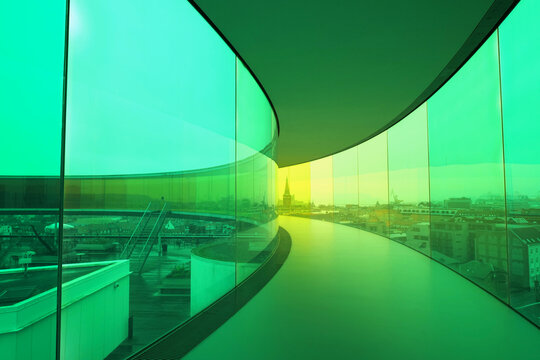 Aarhus, Denmark 11 06 2024 Inside the rainbow rooftop walkway above the Aros art museum. Permanent installation called 'Your rainbow panorama' by Olafur Eliasson made in 2011