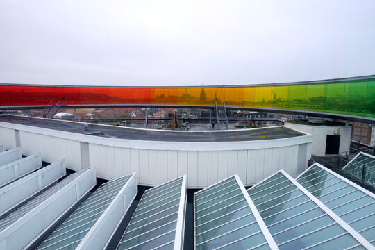 Aarhus, Denmark 11 06 2024 Rainbow rooftop walkway above the Aros art museum. Permanent installation called 'Your rainbow panorama' by Olafur Eliasson made in 2011