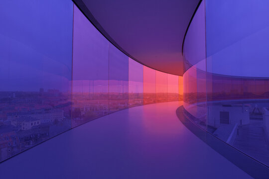 Aarhus, Denmark 11 06 2024 Inside the rainbow rooftop walkway above the Aros art museum. Permanent installation called 'Your rainbow panorama' by Olafur Eliasson made in 2011